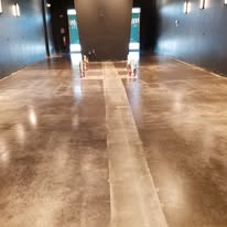 Stained and sealed concrete floor in a commercial showroom