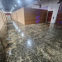 Polished flake epoxy floor in a large commercial space